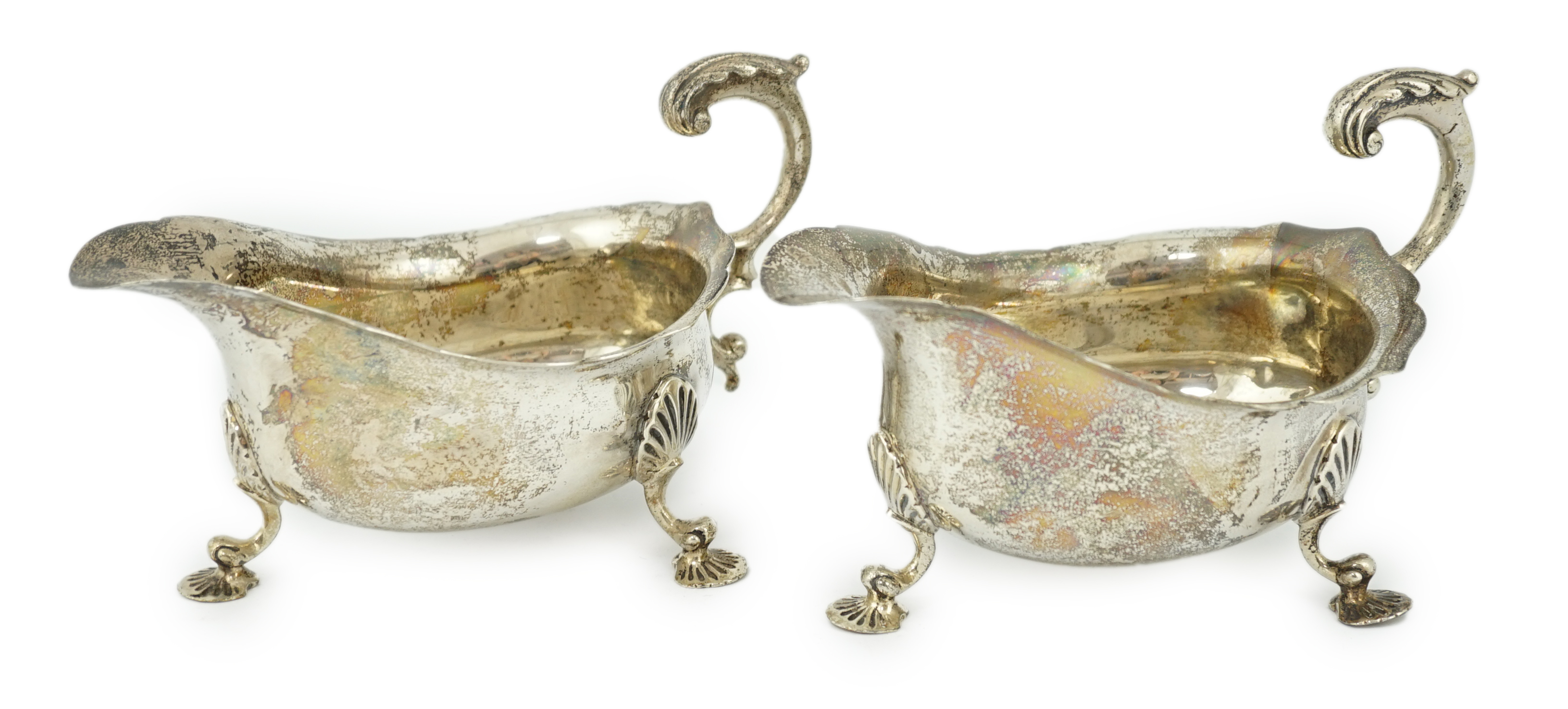 A pair of George V silver sauceboats, by Harrod's Ltd